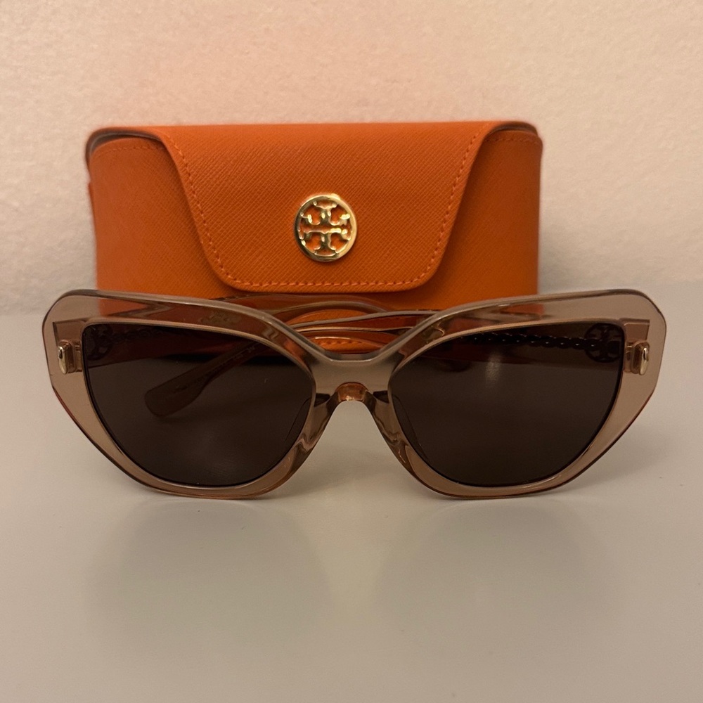 Tory Burch tinted sunglasses.